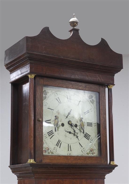 An early 19th century oak eight day longcase clock, 7ft 9in.